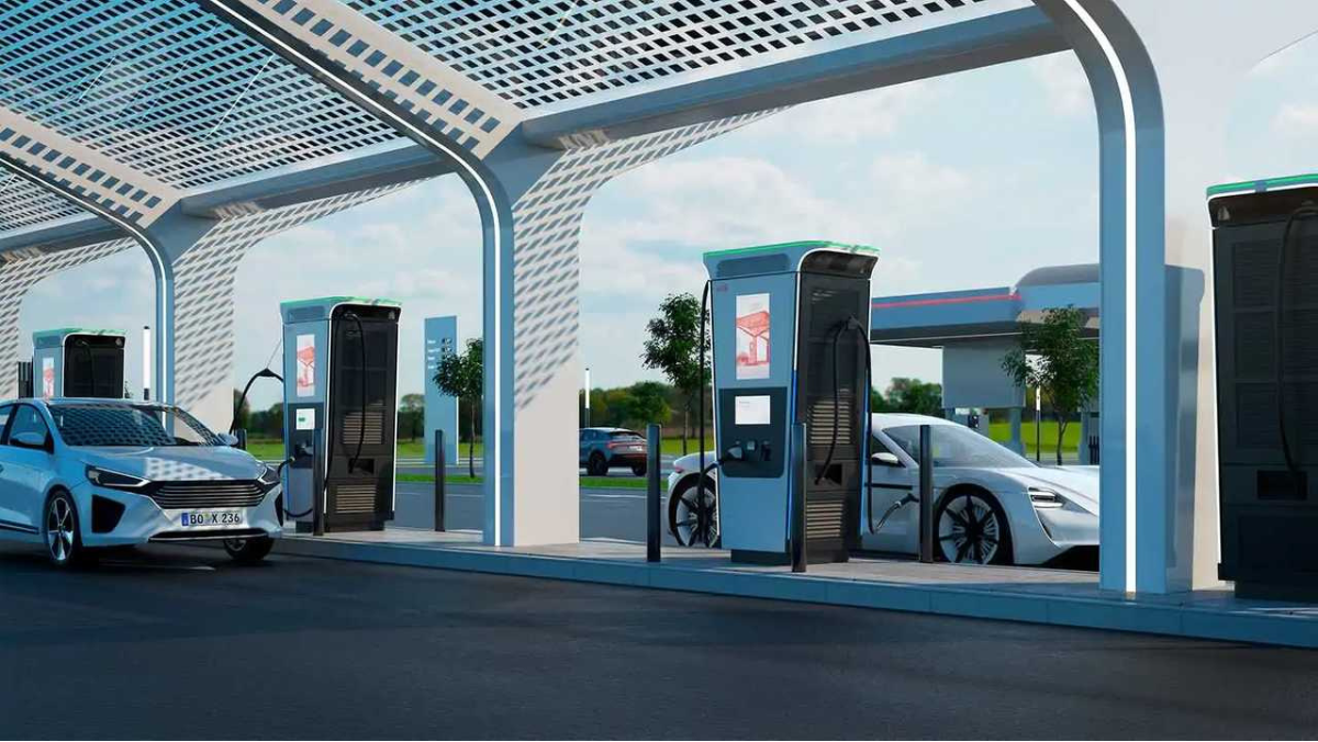 Electric vehicles charging at high-speed EV stations along a European highway corridor