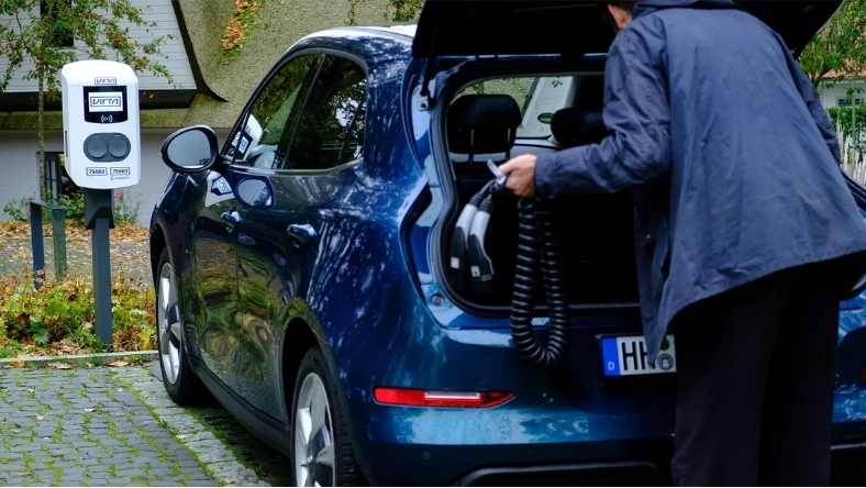 EV plugged into public charging station in Europe