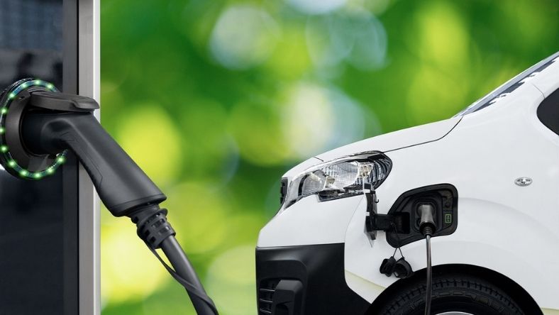 Fast charging connector plugged into electric vehicle